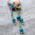 wiaior-lapacz-snow-koraliki-zolty-niebieski-rozowy.webp